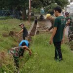 Gotong Royong TNI Dan Warga: Bersama Mereka, Lapangan Sepak Bola Kel. Lajonga Bersinar
