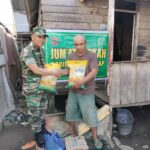 Kasih Sayang Tanpa Batas: TNI Berbagi Sembako Untuk Warga Kurang Mampu Di Kel. Wala
