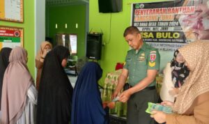 Aksi Babinsa Sertu Basri Dalam Penyaluran BLT Di Desa Bulo
