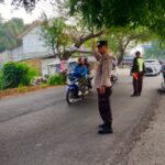 Lakukan Pengaturan Lalulintas, Personil Polsek Telagasari Pastikan Kondusifitas Lalu Lintas
