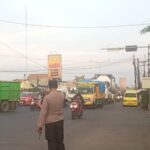 Urai Kemacetan Kendaraan! Polisi Laksanakan Gatur Pagi di Pertigaan Lamer Tanjungpura, Karawang