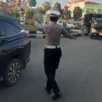 Rutinitas Pagi Hari, Anggota Lantas Polsek Pangalengan Laksanakan Pengaturan Lalu Lintas