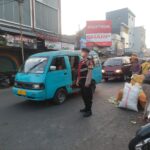 Ciptakan Rasa Aman Dan Nyaman,Polsek Banjaran Tempatkan Anggota Di Jalan Raya Guna Laksanakan Gatur Lantas