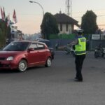 Rutinitas Pagi Hari, Anggota Lantas Polsek Pangalengan Laksanakan Pengaturan Lalu Lintas