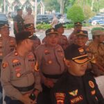 Kapolsek Jatisari Menghadiri Apel Gelar Pasukan dan Simulasi Sispamkota Dalam Rangka Kesiapan Pengamanan Jelang Pilkada Serentak 2024