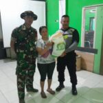 Bhabinkamtibmas Desa Ciparay Bripka Kokon Nurjaman Laksanakan Penyaluran Bantuan Sosial Berupa Beras 10 KG Kepada 543 KPM di Desa Ciparay