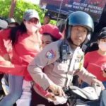 Sigap Selamatkan Pelajar: Aksi Cepat Bhabinkamtibmas di Tengah Gerak Jalan