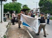 Hari Pertama Masa Tenang, Polres Pematangsiantar Amankan Kegiatan Pembersihan APK