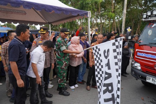Dandim 1420/Sidrap Letkol Inf Andi Zulhakim Asdar, S.H.I., M.H.I. menghadiri pelepasan pengiriman telur Program Makanan Bergizi Gratis dari Kabupaten Sidrap.