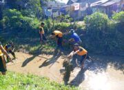 Polsek Pamona Timur Bersama Pemerintah dan Masyarakat Gelar Kerja Bakti Bersihkan Irigasi Sungai Toronggili
